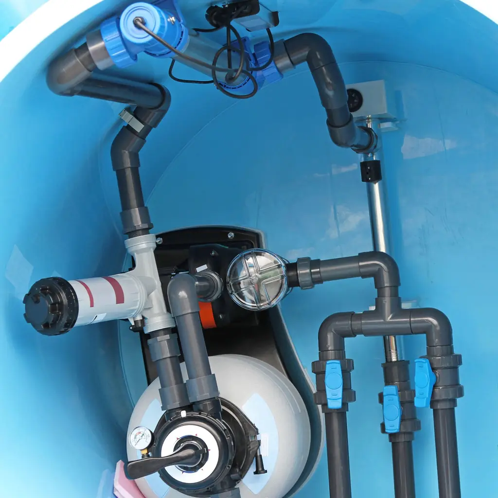 Pool filter and pump plumbing with valves inside the equipment housing